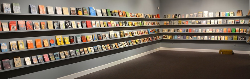 Image of books on display shelves, Robert Smithson Library & Book Club