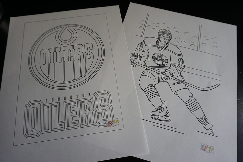 Two sheets from an Edmonton Oilers coloring book, logo of the Oilers and Connor McDavid.