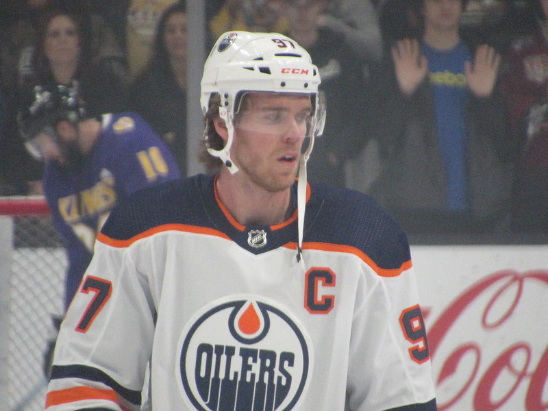 Picture of Connor McDavid in his road white uniform playing versus the Los Angeles Kings in 2020.