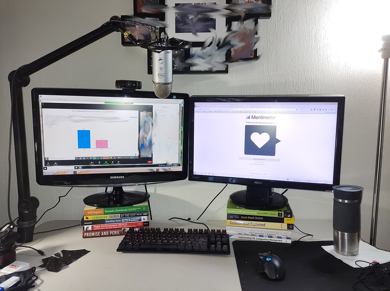 An image of using books to raise up computer monitors to a comfortable height. I recommend that while sitting (or standing) straight in a good position with your eyes at the middle of the monitor.